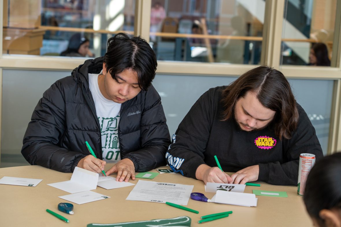 Students writing thank you notes
